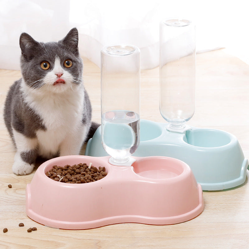 Pet bowl with drinking bottle.